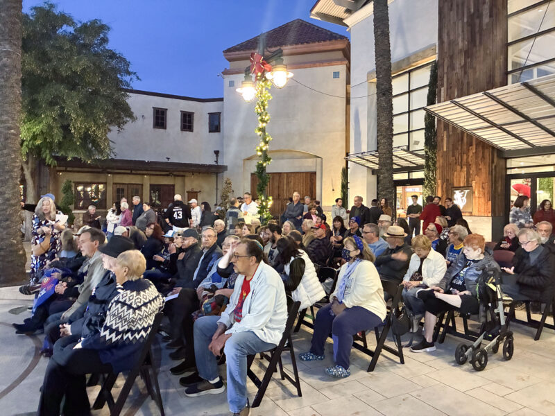 Attendees get ready for the menorah lighting at the Hanukkah at the Mall celebration at Westfield Valencia Town Center in Valencia, Calif., Sunday, Dec. 21, 2025. Kamryn Martell/The Signal