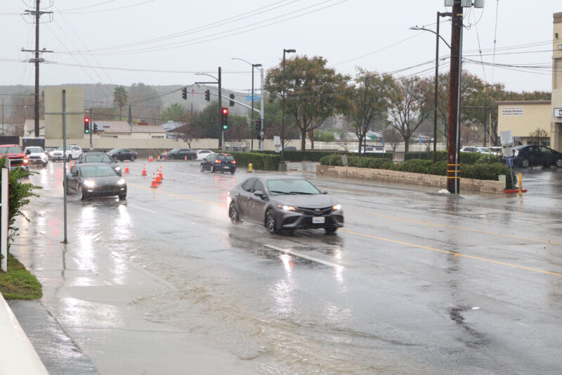 Cars drive through Seco Canyon Road in Saugus, Calif. during a rainstorm, Wednesday, Dec. 24, 2025. Kamryn Martell/The Signal