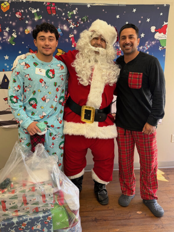 The nonprofit Fostering Youth Independence recently held a holiday party for foster youth in Santa Clarita. FYI’s Charlie Brown Holiday Party was attended by dozens of local foster youth and their volunteer allies. Courtesy photo.