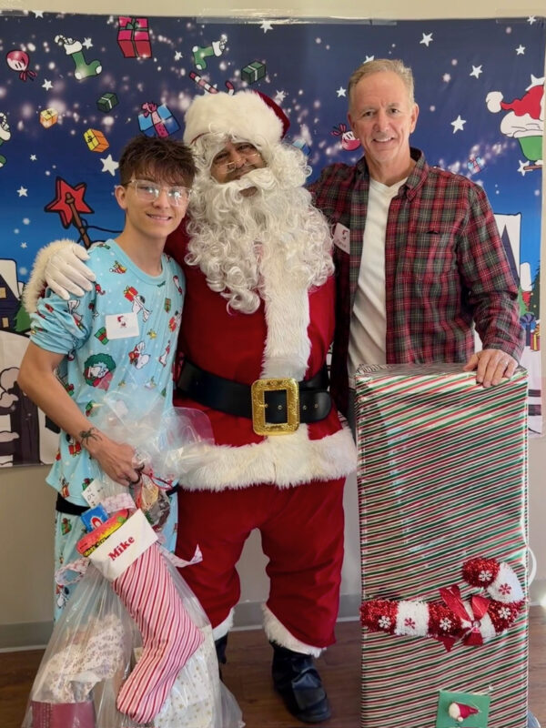 The nonprofit Fostering Youth Independence recently held a holiday party for foster youth in Santa Clarita. FYI’s Charlie Brown Holiday Party was attended by dozens of local foster youth and their volunteer allies. Courtesy photo.