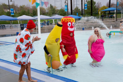 B. Clark (left) cheers on her friends dressed in costumes during the 14th annual Polar Plunge at the Santa Clarita Aquatic Center presented by Kaiser Permanente on Saturday, Jan. 3, 2026. Katherine Quezada/The Signal