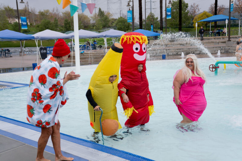 B. Clark (left) cheers on her friends dressed in costumes during the 14th annual Polar Plunge at the Santa Clarita Aquatic Center presented by Kaiser Permanente on Saturday, Jan. 3, 2026. Katherine Quezada/The Signal