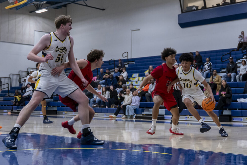 College of the Canyons received a game-high 17 points from freshman enter Craig Irons as the Cougars beat visiting L.A. Pierce College 78-64 on Saturday night. Photo by Carla Sophia Velasco/COC Sports Information.