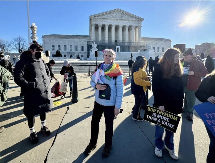 Karen Taylor Soiles, of Boston, Mass., stands outside the Supreme Court of the United States during a protest on Jan. 13, 2026. Photo by Arjun Singh.