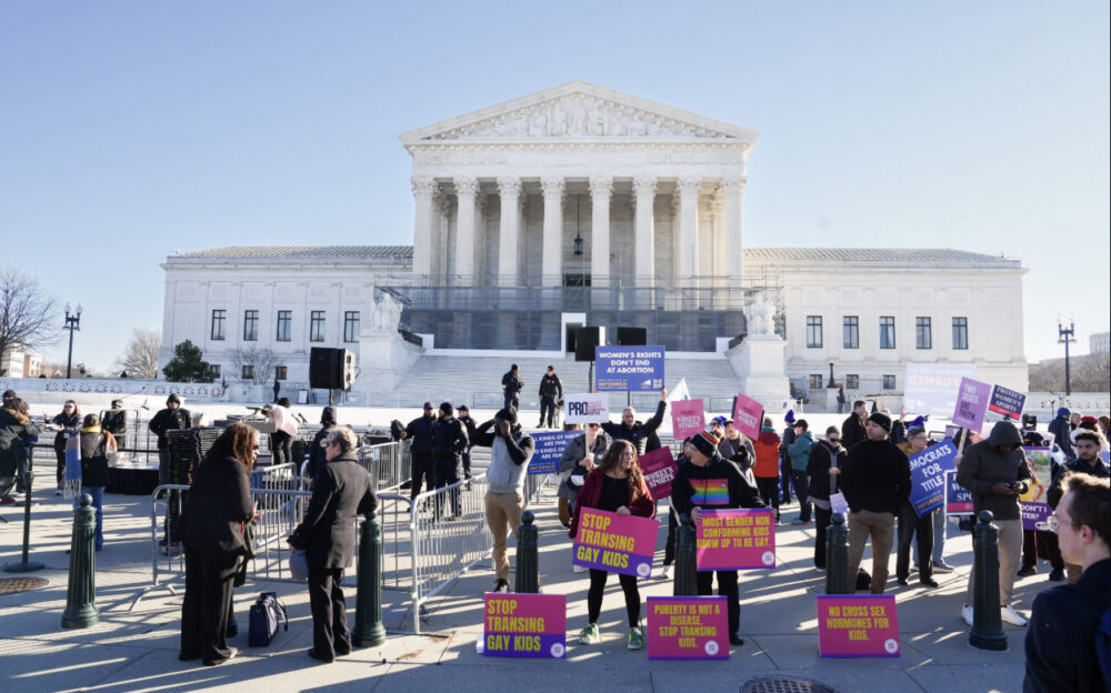 People take part in a rally, in support of Idaho and West Virginia laws protecting women's and girls' sports, at the U.S. Supreme Court in Washington on Jan. 13, 2026. Photo by Madalina Kilroy.