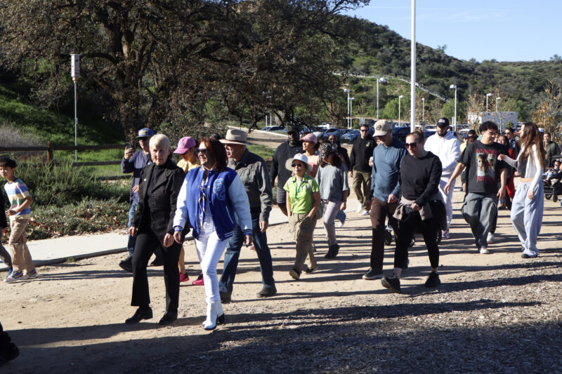 Laurene Weste (all black) and Patsy Ayala (blue jacket, white pants) walk with the community at the 2026 Dr. Martin Luther King Jr. Unity Walk at Central Park in Saugus, Calif., Monday, Jan. 19, 2026. Kamryn Martell/The Signal