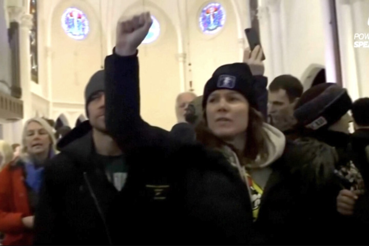 Protesters disrupt services at the Cities Church in St. Paul, Minn., on Jan. 18, 2026, in a still from video. Screenshot from SPEAK MLPS.