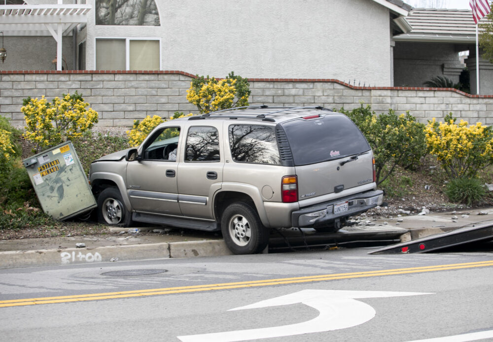 An SUV crashed into a wall at the intersection of Seco Canyon Road and Coral Way, causing a power outage in the Saugus neighborhood on Thursday, Jan. 22, 2026. Habeba Mostafa/ The Signal