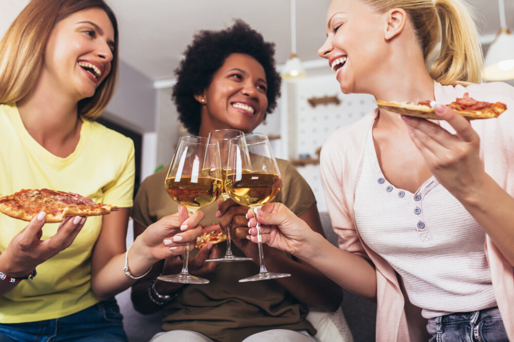 Celebrate two of February’s National Food Days with pizza and wine. ©ADOBE STOCK