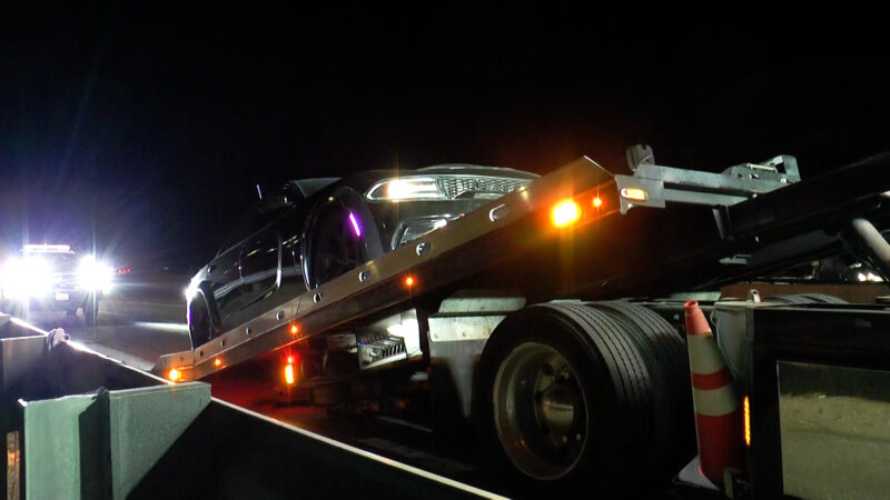 A car gets loaded on a truck bed after a pursuit on State Route 14 near Soledad Canyon Road. Signal file photo.