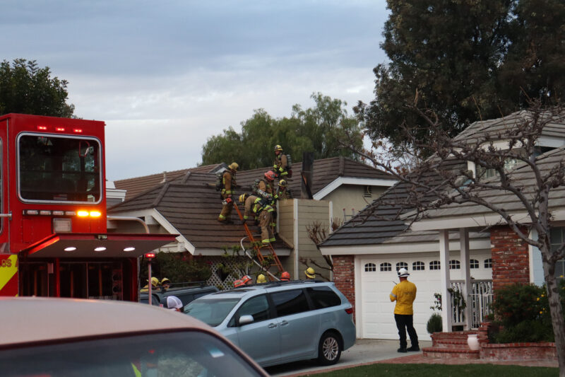 Los Angeles County Fire Department personnel works to extinguish a chimney fire on the 26000 block of Moreno Drive in Valencia, Sunday, Jan. 25, 2025. Kamryn Martell/The Signal