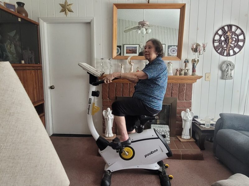 Alice Sumner rides her stationary bike for at least 10 minutes every day. Photo courtesy of Jeffrey Tucker.