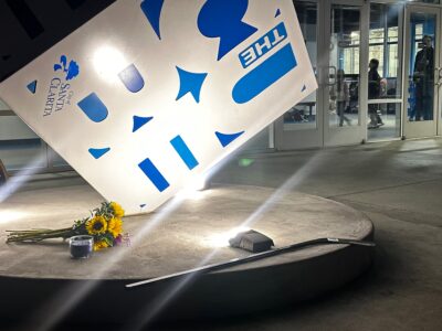 Flowers and a hockey stick were placed near the entrance of The Cube in Valencia after members of a girls hockey team were involved in a crash in Colorado that killed the father of one of the girls on Thursday, Jan. 29, 2026. Katherine Quezada/The Signal