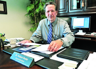 Retiring Sulphur Springs Union School District Superintendent Robert Nolet in his office on Friday., June 6, 2014. Signal file photo.