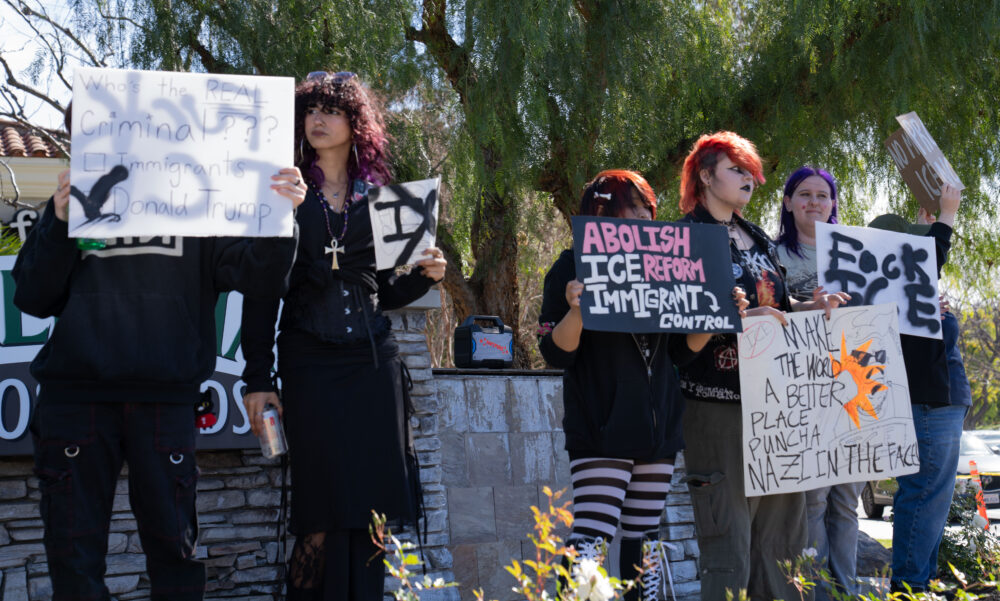 Students gather at the corner of Valencia Boulevard and McBean Parkway to protest Immigration Customs Enforcement on Saturday, Feb. 21, 2026. Katherine Quezada/The Signal