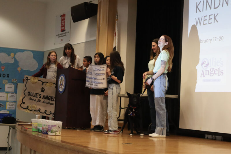 Oak Hills Elementary School students present a check to Foxy, Gina Murphy (C) and Tara Bennett (R) of Ollie's Angels at a school assembly, Tuesday, Feb. 24, 2026. Kamryn Martell/The Signal