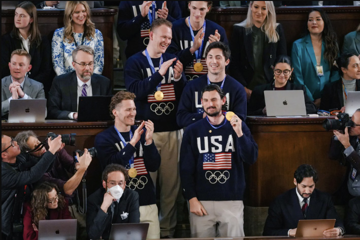 Connor Hellebuyck (center R), goaltender for the U.S. men’s Olympic hockey team, and other members of the team, attend President Donald Trump’s first State of the Union address during his second presidential term, in the House Chamber on Capitol Hill in Washington on Feb. 24, 2026. Photo by Madalina Kilroy.