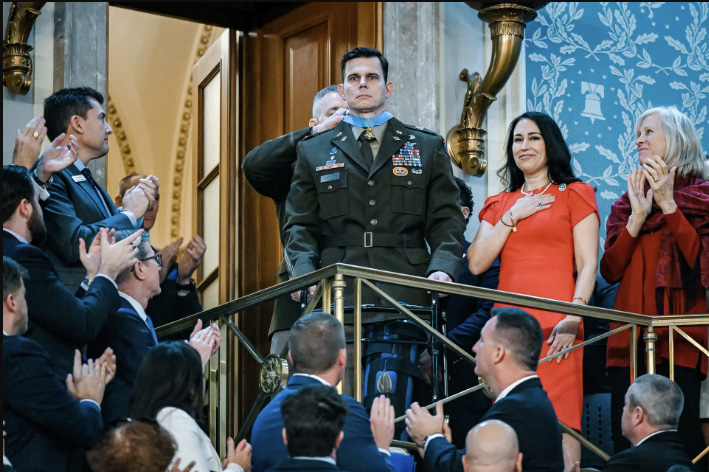 U.S. Army Chief Warrant Officer Eric Slover receives the Medal of Honor as President Donald Trump delivers the State of the Union address during a joint session of Congress at the U.S. Capitol on Feb. 24, 2026. Kenny Holston-Pool/Getty Images.
