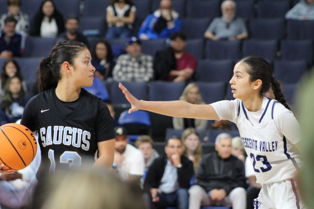 Saugus senior guard EvaMarie Rios looking for an open pass during the CIF-SS Division 2 Championship game against the Crescenta Valley Falcons at the Toyota Arena in Ontario on Feb 27, 2026. Ryan Romero/The Signal