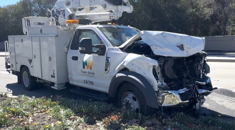 A Los Angeles County Public Works truck endures damage after a fatal traffic collision on Newhall Avenue and Sierra Highway, Sunday, March 1, 2026. Signal Staff photo.