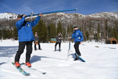 The California Department of Water Resources (from left) Engineer Derick Louie, Hydrometeorologist Angelique Fabbiani-Leon, Snow Survey and Water Supply Forecasting Unit Manager Andy Reising and Engineer Jordan Thoennes conduct the third media snow survey of the 2026 season at Phillips Station in the Sierra Nevada. The snow survey is held in the mountain range approximately 90 miles east of Sacramento off Highway 50 in El Dorado County. Photo taken February 27, 2026.