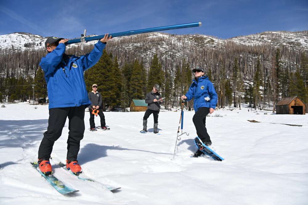 The California Department of Water Resources (from left) Engineer Derick Louie, Hydrometeorologist Angelique Fabbiani-Leon, Snow Survey and Water Supply Forecasting Unit Manager Andy Reising and Engineer Jordan Thoennes conduct the third media snow survey of the 2026 season at Phillips Station in the Sierra Nevada. The snow survey is held in the mountain range approximately 90 miles east of Sacramento off Highway 50 in El Dorado County. Photo taken February 27, 2026.