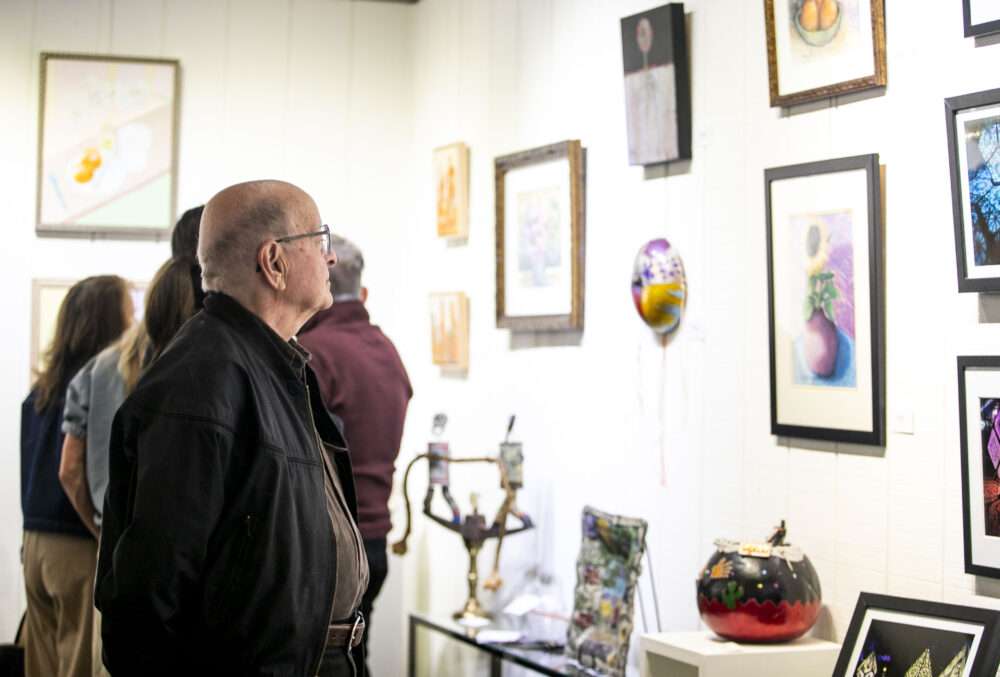 Guests observed the variations of vessels displayed by SCAA artists during the art exhibit of "Vessels" in Old Town Newhall on Saturday, March 7, 2026. Habeba Mostafa/ The Signal