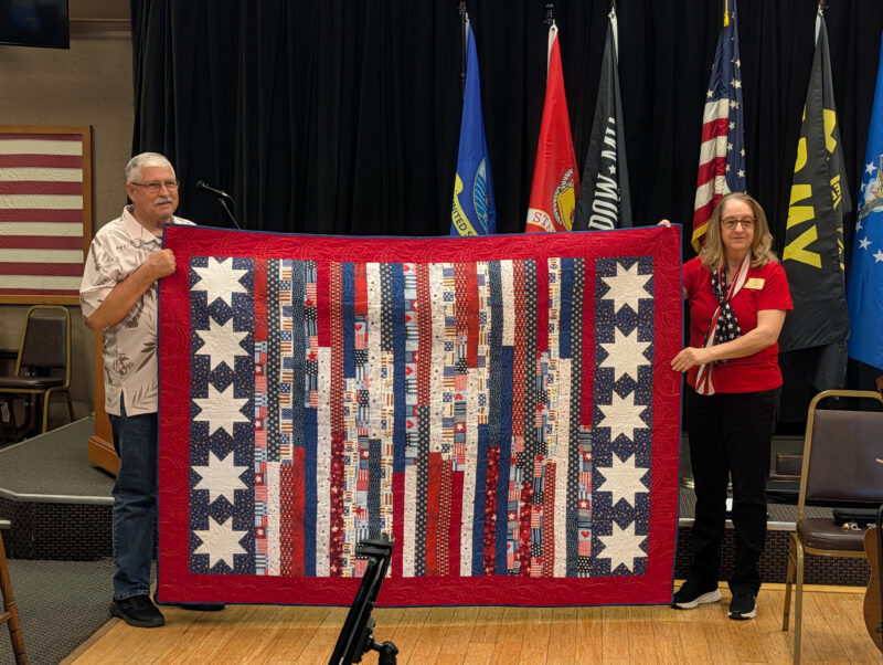 Elk Donna Kiger awards Elk Vietnam veteran Dale Turner a hand-crafted quilt made by Quilts of Valor. Courtesy photo.