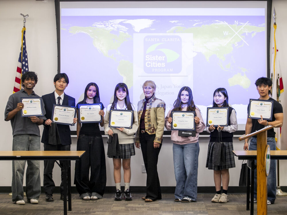The visiting students stand with the host students and Mayor Laurene Weste during the Sister Cities Matsudo Delegation Welcome and Youth Exchange at Santa Clarita City Hall on Thursday, March 12, 2026. Habeba Mostafa/ The Signal