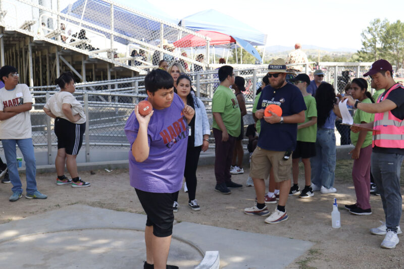 Gavin Villanueva (purple shirt), a Valencia High School student, does the shot put at the 14th annual Hart Games at Valencia High School in Valencia, Calif., Monday, March 16, 2026. Kamryn Martell/The Signal