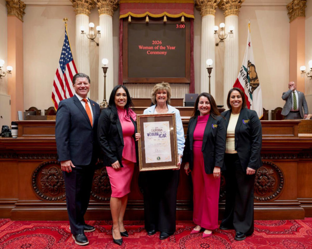 Sen. Suzette Martinez Valladares (second from left) honored Jill Mellady (center) as Woman of the Year for Senate District 23 during a floor ceremony at the State Capitol on March 16. Courtesy photo.