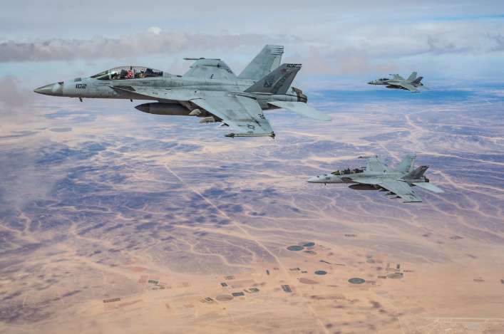U.S. Navy F/A-18 Super Hornets, assigned to the Harry S. Truman Carrier Strike Group, fly a mission over the U.S. Central Command area of responsibility on March 3, 2025. Staff Sgt. Jackson Manske/U.S. Air Force