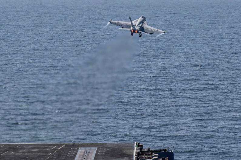 An F/A-18E Super Hornet attached to Strike Fighter Squadron (VFA) 151, takes off from the flight deck of Nimitz-class aircraft carrier USS Abraham Lincoln in support of Operation Epic Fury, on Feb. 28, 2026. U.S. Navy via Getty Images
