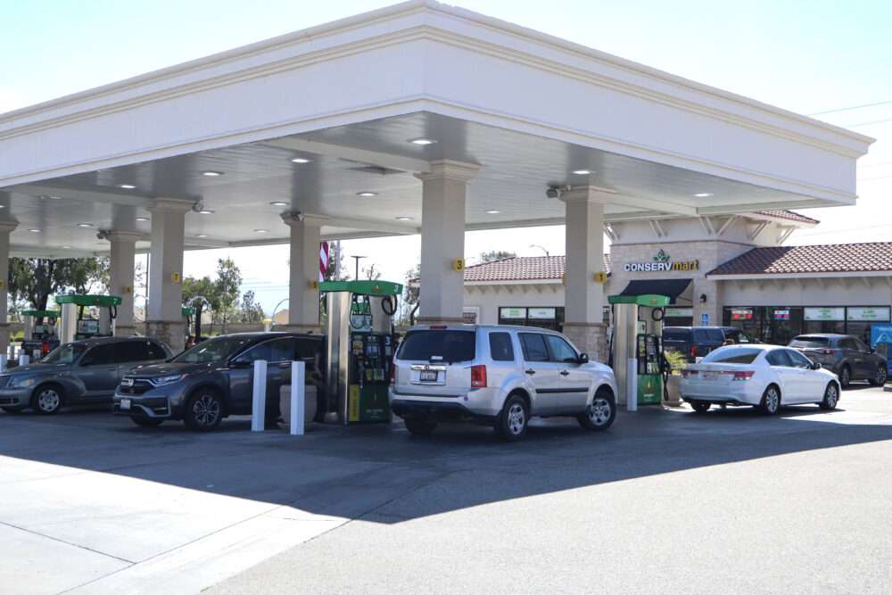 Cars pump their gas at ConservFuel in Valencia, Calif., Sunday, March 29, 2026. Kamryn Martell/The Signal