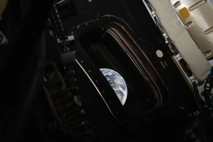A view of Earth taken by NASA astronaut and Artemis II commander Reid Wiseman from one of the Orion spacecraft's four main windows after completing the translunar injection burn on April 2, 2026. (NASA/Reid Wiseman).