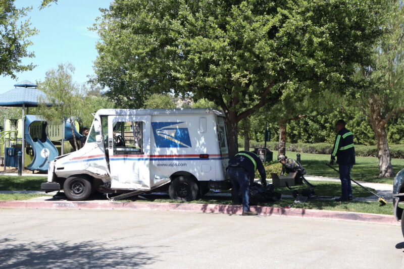 A mail truck endures significant damage on its side after a traffic collision on Prima Way and Propello Drive in Canyon Country, Monday, April 6, 2026. Kamryn Martell/The Signal