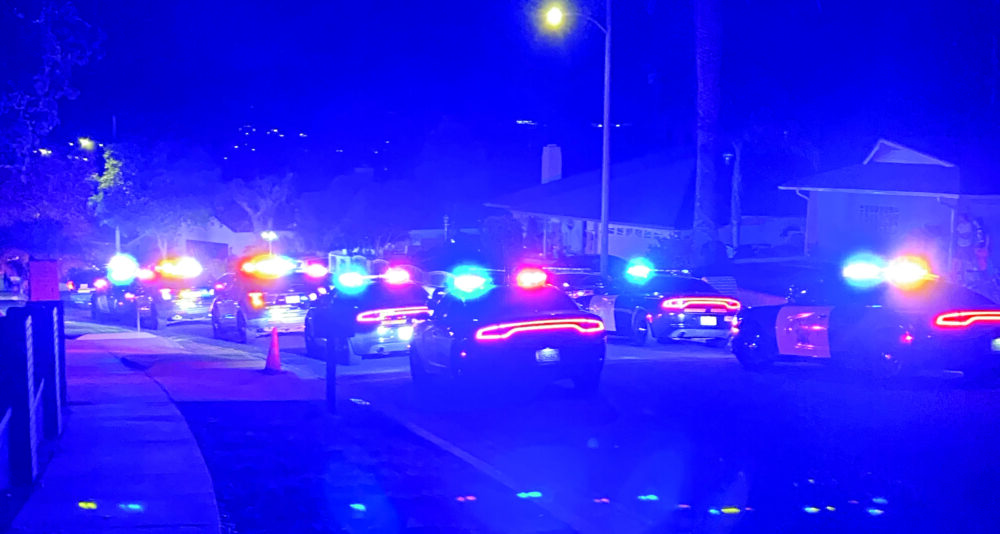 Law enforcement officers surround the location of a barricaded suspect April 11, 2026. Photo courtesy of Dillon Foster.
