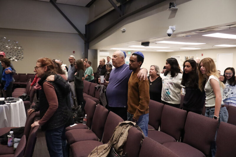 Attendees join together in song at the "The Symphony of the Holocaust" screening at Congregation Beth Shalom in Santa Clarita, Calif., Sunday, April 12, 2026. Kamryn Martell/The Signal