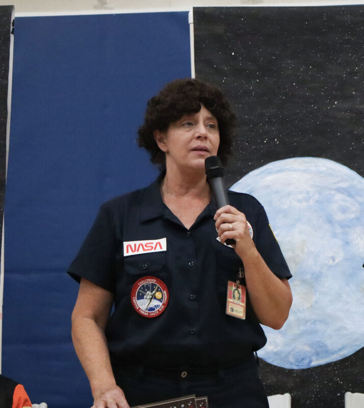 Louise Willard, dressed as Sally Ride, speaks to the audience at the 16th annual "Women in History" at Saugus High School in Saugus, Calif., Monday, April 13, 2026. Kamryn Martell/The Signal