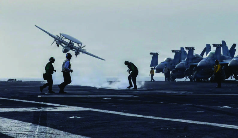 An E-2D Hawkeye, attached to Airborne Command & Control Squadron (VAW) 117, launches from the flight deck of Nimitz-class aircraft carrier USS Abraham Lincoln (CVN 72) during Operation Epic Fury, on March 31, 2026. Courtesy of the U.S. Navy