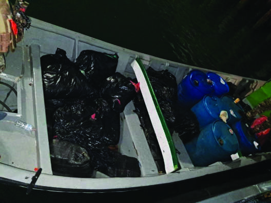 359 kilograms (roughly 792 pounds) of cocaine and 886 pounds of marijuana seized from go-fast vessel during a combined international operation. (Courtesy of Joint Interagency Task Force (X))