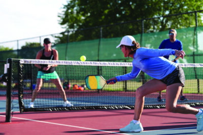 Pickleball is generally easy for complete beginners to pick up. The gear is lighter and cheaper, the court is smaller and the ball moves more slowly. ©ADOBESTOCK