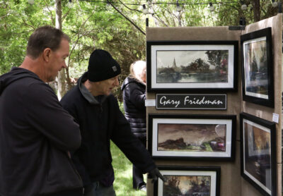 Kevin Lundby (L) speaks with featured artist Gary Friedman at the 12th annual Santa Clarita Artists Association's Spring Art Show at Le Chene French Cuisine in Santa Clarita, Calif., Sunday, April 26, 2026. Kamryn Martell/The Signal
