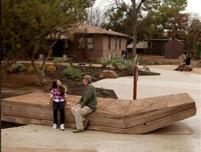 Orit Haj, located at Vasquez Rocks Natural Area, is a tribute to the Tataviam culture of the SCV. The artist team Didier Hess and community members used a mixture of soil and cement compacted into forms to create a solid earthen structure. People are encouraged to touch and climb on the artwork which is designed to decompose over the years to reveal personal artifacts embedded by the participants as the artwork slowly erodes. Photo Courtesy Los Angeles County Department of Arts and Culture. 