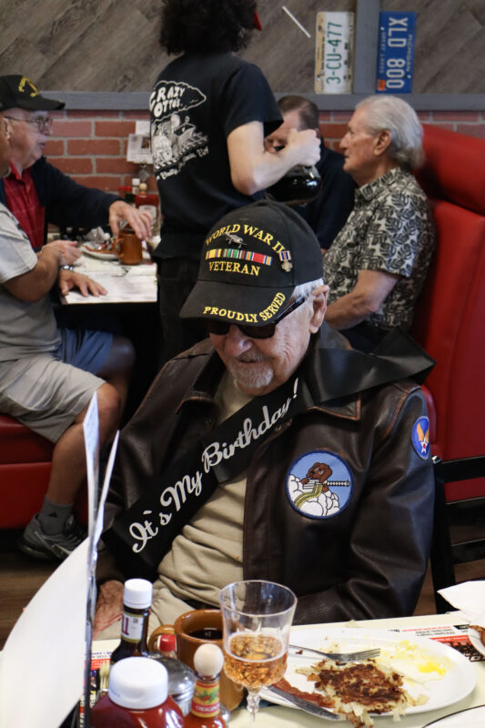 Ken Placek is given a birthday sash at his birthday breakfast during Coffee 4 Veterans at Crazy Otto's Diner in Canyon Country, Calif., Thursday, May 7, 2026. Kamryn Martell/The Signal