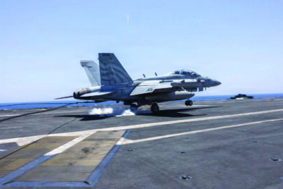 An F/A-18E Super Hornet lands on the flight deck of aircraft carrier USS George H.W. Bush on April 27, 2026. U.S. Navy photo