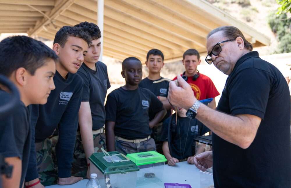 Read more about the article Action drug rehab CEO and Signal show host displays snakes for Young Marines 