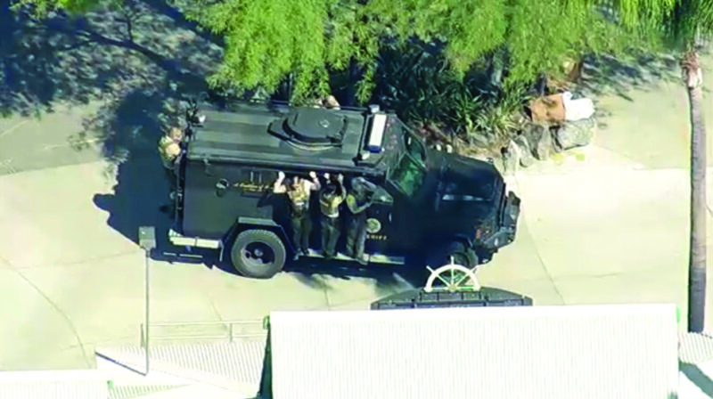Aerial video from the ABC7 helicopter showed a fire engine and more than a dozen LASD vehicles at the scene, including an armored vehicle that was part of the sweep by deputies as they investigated a bomb threat at Six Flags Magic Mountain on Monday, May 11, 2026. Screenshot courtesy of ABC7.