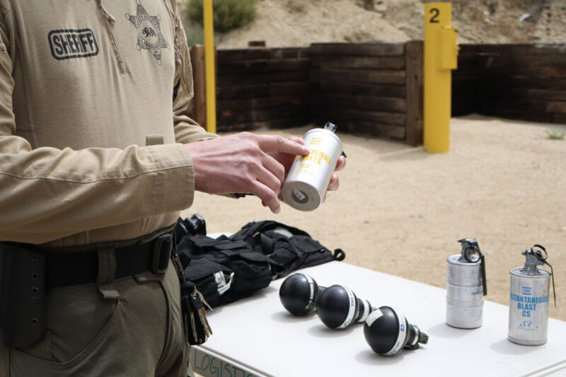 A sgt. shows a can of smoke used as tactical tool at the Los Angeles Sheriff's Department Sheriff's Response Team training at Pitchess Detention Center in Castaic, Calif., Thursday, May 28, 2026. Kamryn Martell/The Signal