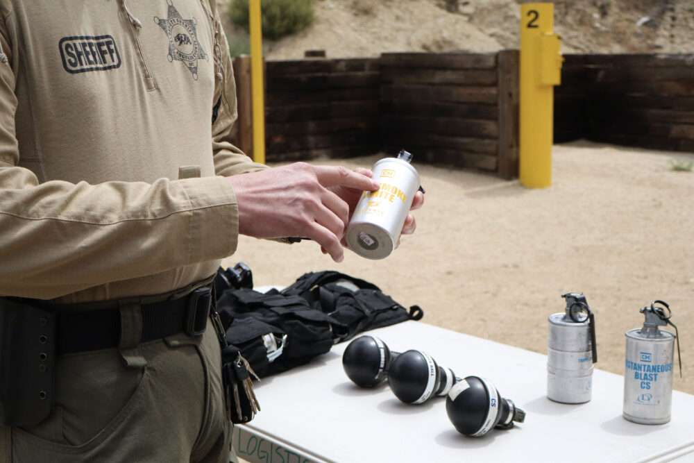 A sgt. shows a can of smoke used as tactical tool at the Los Angeles Sheriff's Department Sheriff's Response Team training at Pitchess Detention Center in Castaic, Calif., Thursday, May 28, 2026. Kamryn Martell/The Signal